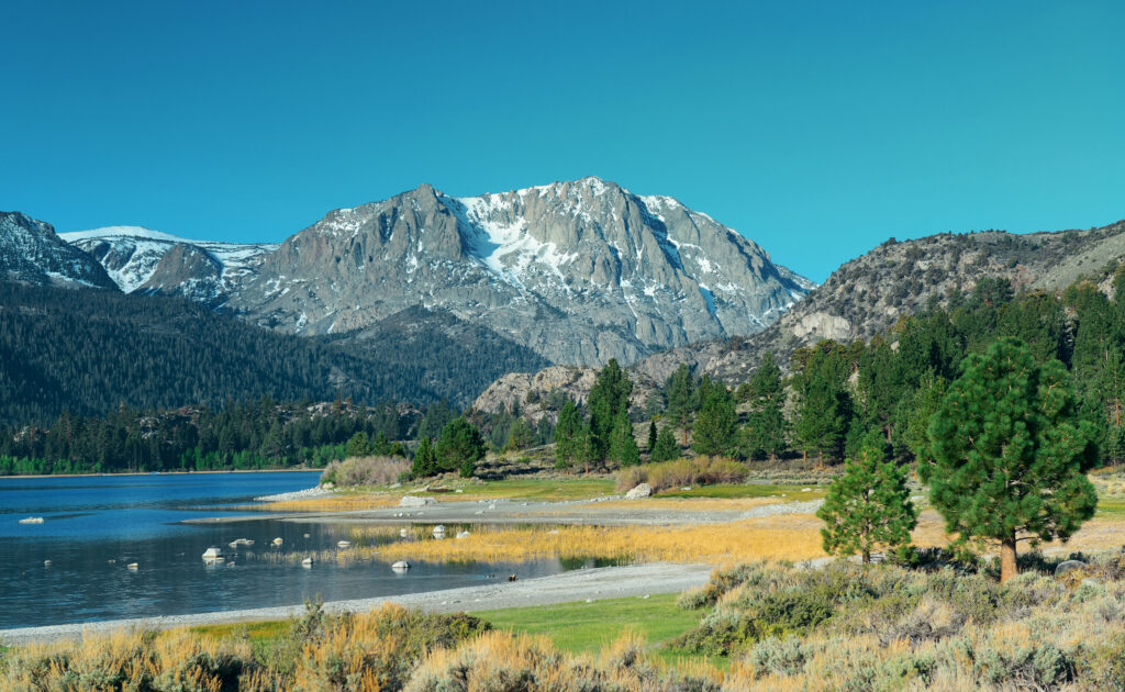 snow mountain lake with reflections yosemite